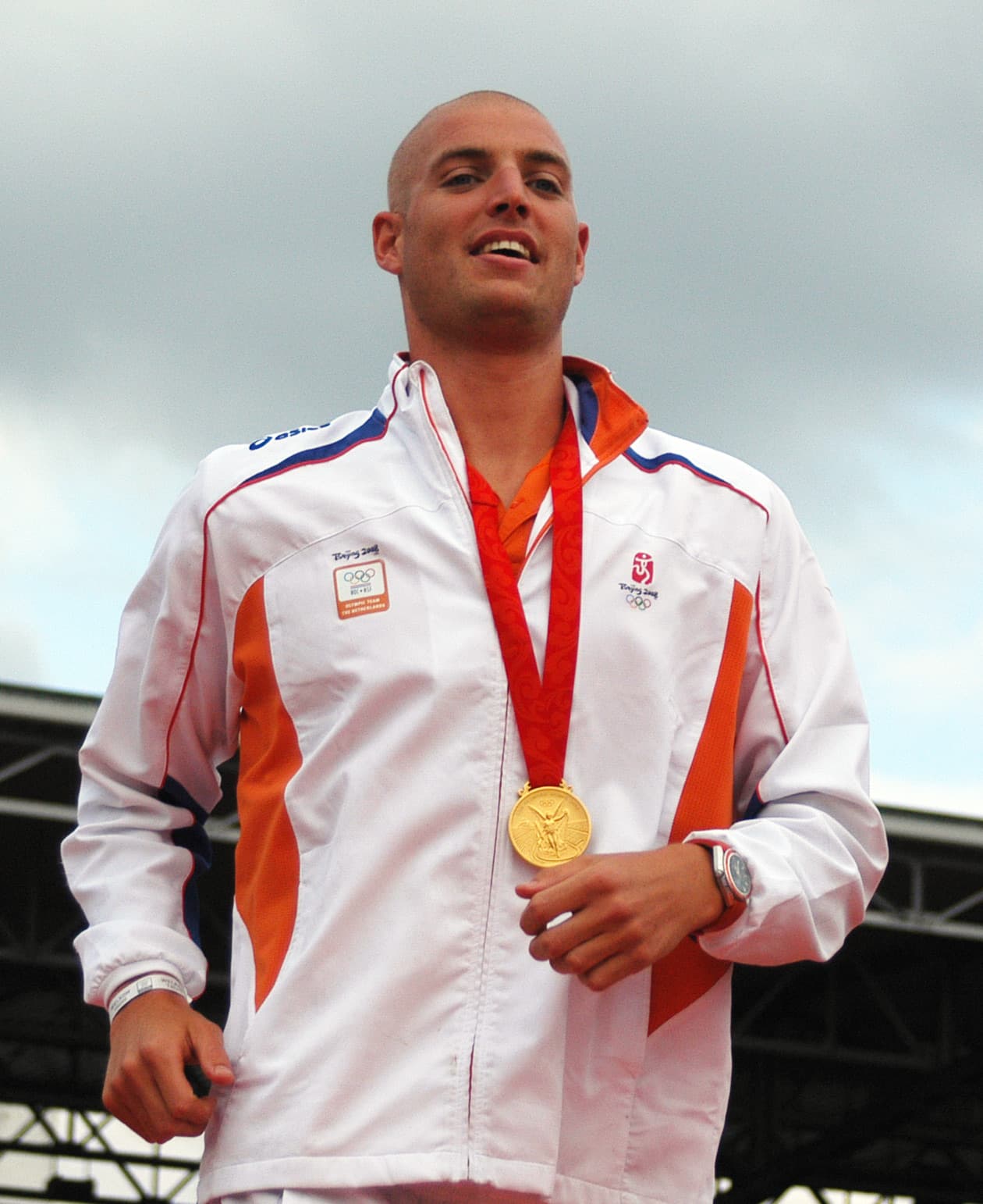 Maarten wearing his Olympic gold medal at the team homecoming in Amsterdam, 2008